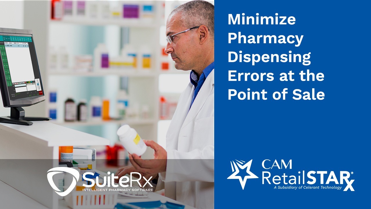 Pharmacist holds a prescription bottle while standing at a point of sale screen.