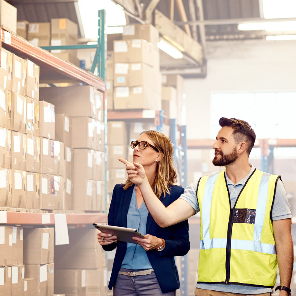 Workers in a warehouse using Stratus Enterprise